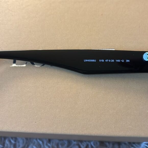 Loewe Paula Ibiza Flower
Shaped Sunglasses in Black / New in Box and Case - Picture 8 of 10